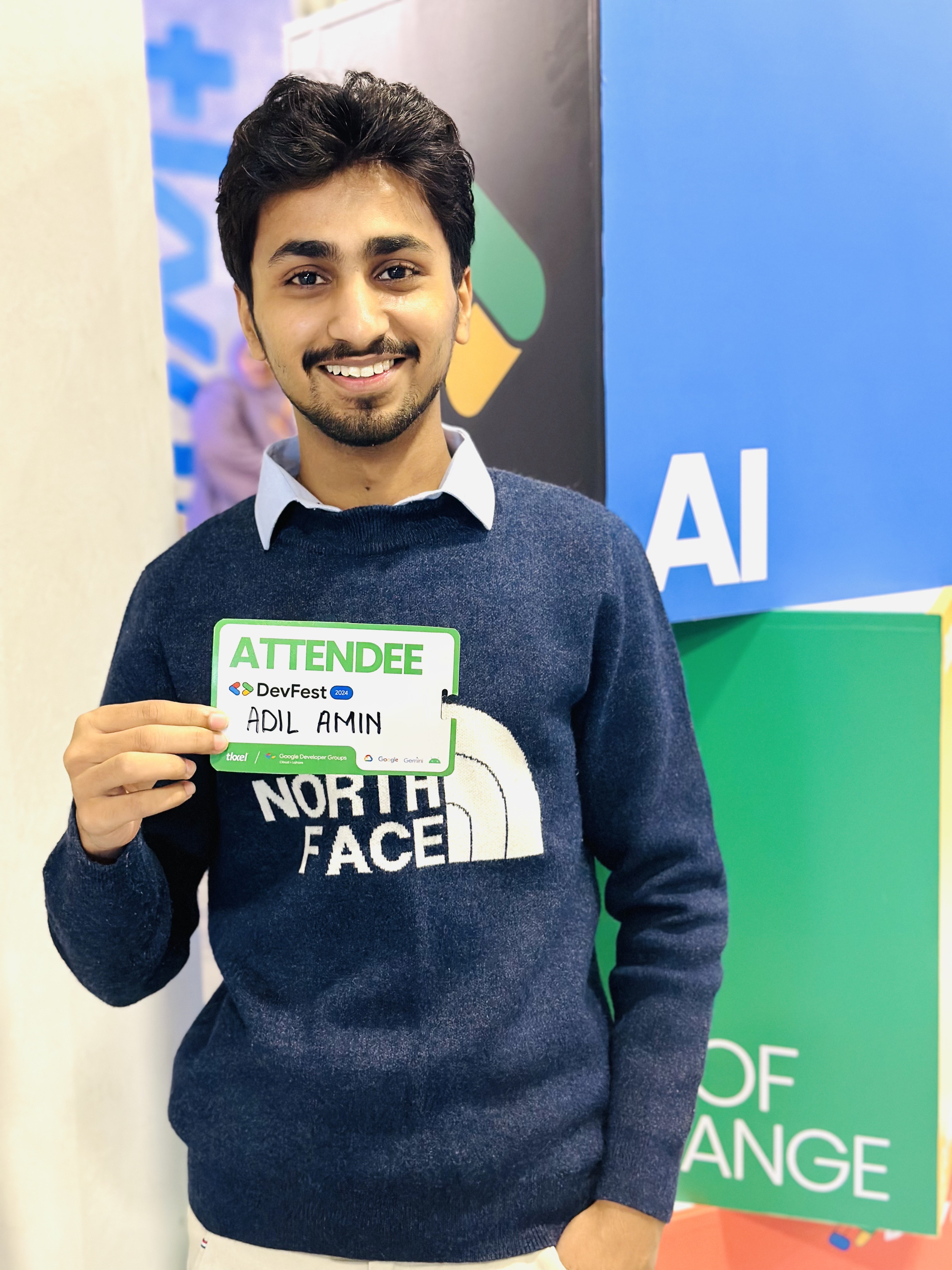 Engineer Adil Amin at DevFest Google event hosted by Tkxel